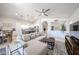 Bright and spacious living room with a large sectional sofa and open floor plan at 4765 E Charleston Ave, Phoenix, AZ 85032