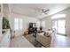 Inviting living room with vaulted ceilings, natural light, and tile flooring at 4765 E Charleston Ave, Phoenix, AZ 85032