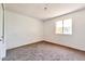 A bright bedroom features neutral carpet and light-colored walls, providing a calming atmosphere at 504 N Emerson --, Mesa, AZ 85201