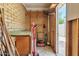 Organized garage space, equipped with a workbench and tools, provides ample storage and workspace at 504 N Emerson --, Mesa, AZ 85201