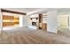 Comfortable living space with a fireplace, built-in shelving, and easy kitchen access at 504 N Emerson --, Mesa, AZ 85201