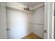 Walk-in closet with white walls, wood flooring, and shelves at 5122 E Shea Blvd # 1043, Scottsdale, AZ 85254