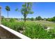 Beautiful golf course view with a pond and mature trees at 5122 E Shea Blvd # 1043, Scottsdale, AZ 85254