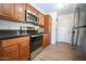 Modern kitchen features stainless steel appliances, updated cabinets, and plenty of natural light from door to laundry room at 5122 E Shea Blvd # 1043, Scottsdale, AZ 85254