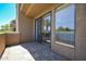 Private patio with view into the home and textured flooring at 5122 E Shea Blvd # 1043, Scottsdale, AZ 85254