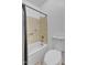 Cozy bathroom featuring a tub and shower combination and a toilet at 5322 W Wethersfield Dr, Glendale, AZ 85304