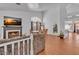 Spacious open-plan design with hardwood floors, fireplace and an adjacent dining area at 5322 W Wethersfield Dr, Glendale, AZ 85304