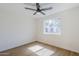 Bright bedroom with a view, showcasing luxury vinyl flooring and natural light at 6601 N 46Th Ln, Glendale, AZ 85301