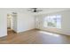Inviting living room with wood floors, natural light, and a view of the front yard at 6601 N 46Th Ln, Glendale, AZ 85301