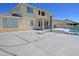 Rear view of home with basketball court, pool, and outdoor kitchen at 6619 W Cordia Ln, Phoenix, AZ 85083
