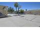 Full basketball court in the backyard, perfect for recreation and Gathering fun at 6619 W Cordia Ln, Phoenix, AZ 85083