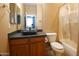 Bathroom featuring a vessel sink and tub with shower at 6619 W Cordia Ln, Phoenix, AZ 85083