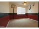A carpeted bedroom features basketball-themed decor and a window with blinds at 6619 W Cordia Ln, Phoenix, AZ 85083