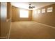Bedroom with ceiling fan and lots of natural light at 6619 W Cordia Ln, Phoenix, AZ 85083