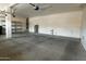 The garage features built-in shelving and space for two vehicles at 6619 W Cordia Ln, Phoenix, AZ 85083