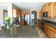 Gourmet kitchen featuring stainless steel appliances, granite countertops, and ample cabinet space at 6619 W Cordia Ln, Phoenix, AZ 85083