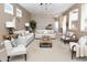 Neutral living room with comfortable seating, modern decor, and plenty of natural light at 6619 W Cordia Ln, Phoenix, AZ 85083