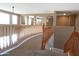Upstairs loft featuring railing to overlook below at 6619 W Cordia Ln, Phoenix, AZ 85083