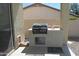 Outdoor kitchen with built-in grill, perfect for entertaining at 6619 W Cordia Ln, Phoenix, AZ 85083