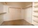 Walk-in closet with custom shelving providing ample storage at 6619 W Cordia Ln, Phoenix, AZ 85083