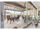 Spacious covered back patio offers a perfect outdoor dining area with serene backyard views at 6929 E Quill St, Mesa, AZ 85207