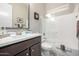 Bathroom featuring a modern vanity with plentiful counterspace, tub, and shower at 6929 E Quill St, Mesa, AZ 85207