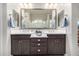 Stylish bathroom features double sinks, a large mirror, and ample counter space for convenience at 6929 E Quill St, Mesa, AZ 85207
