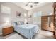Serene bedroom with ample natural light, complemented by a cozy layout for a restful ambiance at 6929 E Quill St, Mesa, AZ 85207