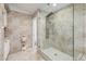 Beautiful bathroom with tiled walk-in shower, elegant fixtures, and decorative accents at 6941 W Voltaire Ave, Peoria, AZ 85381