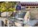 Stainless steel grill and outdoor kitchen area, perfect for outdoor cooking and entertaining at 6941 W Voltaire Ave, Peoria, AZ 85381