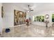 Living area with high ceilings, stylish decor, and abundant natural light at 6941 W Voltaire Ave, Peoria, AZ 85381