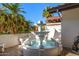 Detailed outdoor water fountain featuring sculptural frog accents at 6941 W Voltaire Ave, Peoria, AZ 85381