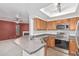 Kitchen view to living room with stainless steel appliances at 750 E Northern Ave # 2045, Phoenix, AZ 85020
