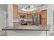 Modern kitchen with stainless steel appliances, wooden cabinets, and ample counter space at 750 E Northern Ave # 2045, Phoenix, AZ 85020