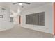 Spacious living room with neutral carpet and open layout at 750 E Northern Ave # 2045, Phoenix, AZ 85020