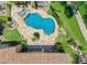 Aerial view of the custom pool and spa with lush landscaping at 7734 E Monica Dr, Scottsdale, AZ 85255