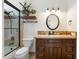 Bathroom showcasing a shower, toilet, and vanity with custom wood cabinets and granite countertops at 7734 E Monica Dr, Scottsdale, AZ 85255