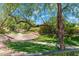 Manicured green space and walking path provide a serene outdoor escape at 7734 E Monica Dr, Scottsdale, AZ 85255