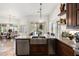 Entertain with ease in this beautiful kitchen, featuring a large island with stainless steel sink at 7734 E Monica Dr, Scottsdale, AZ 85255