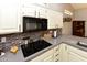 Modern kitchen featuring gray countertop, tile backsplash, and stainless steel sink at 7916 E Naranja Ave, Mesa, AZ 85209