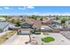 Charming two-story home with a refreshing pool, a well-kept lawn, and beautiful landscaping in a peaceful community at 8871 W Maryland Ave, Glendale, AZ 85305