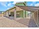 View of backyard, covered patio, and shed at 8871 W Maryland Ave, Glendale, AZ 85305