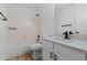 This is a clean bathroom with wood floors, a shower, and a sink at 9343 W Harmony Ln, Peoria, AZ 85382