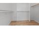 Empty closet with shelving and rod for hanging clothes at 9343 W Harmony Ln, Peoria, AZ 85382