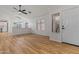 Bright and spacious living room with wood floors and neutral walls at 9343 W Harmony Ln, Peoria, AZ 85382