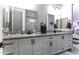 Bathroom features double vanity with granite countertops and modern fixtures at 943 E Kortsen Rd # 2, Casa Grande, AZ 85122