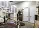 Bright bedroom features carpeted floors, a ceiling fan, and closet space at 943 E Kortsen Rd # 2, Casa Grande, AZ 85122