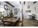 Cozy dining room with hardwood floors, unique decor, and ample natural light at 943 E Kortsen Rd # 2, Casa Grande, AZ 85122