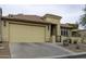 Lovely home featuring a two-car garage, desert landscaping, and a secure gated entry at 943 E Kortsen Rd # 2, Casa Grande, AZ 85122