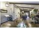 Open-concept living space with a view of the modern kitchen and rustic dining room at 943 E Kortsen Rd # 2, Casa Grande, AZ 85122
